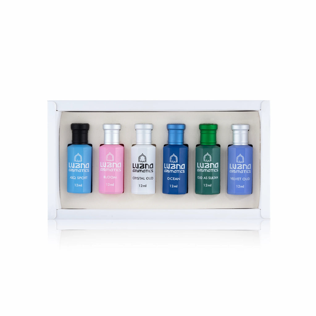 Premium fragrance gift set by Lubna Aromatics displayed in a sleek luxury box with six signature attar scents