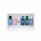 Premium fragrance gift set by Lubna Aromatics displayed in a sleek luxury box with six signature attar scents