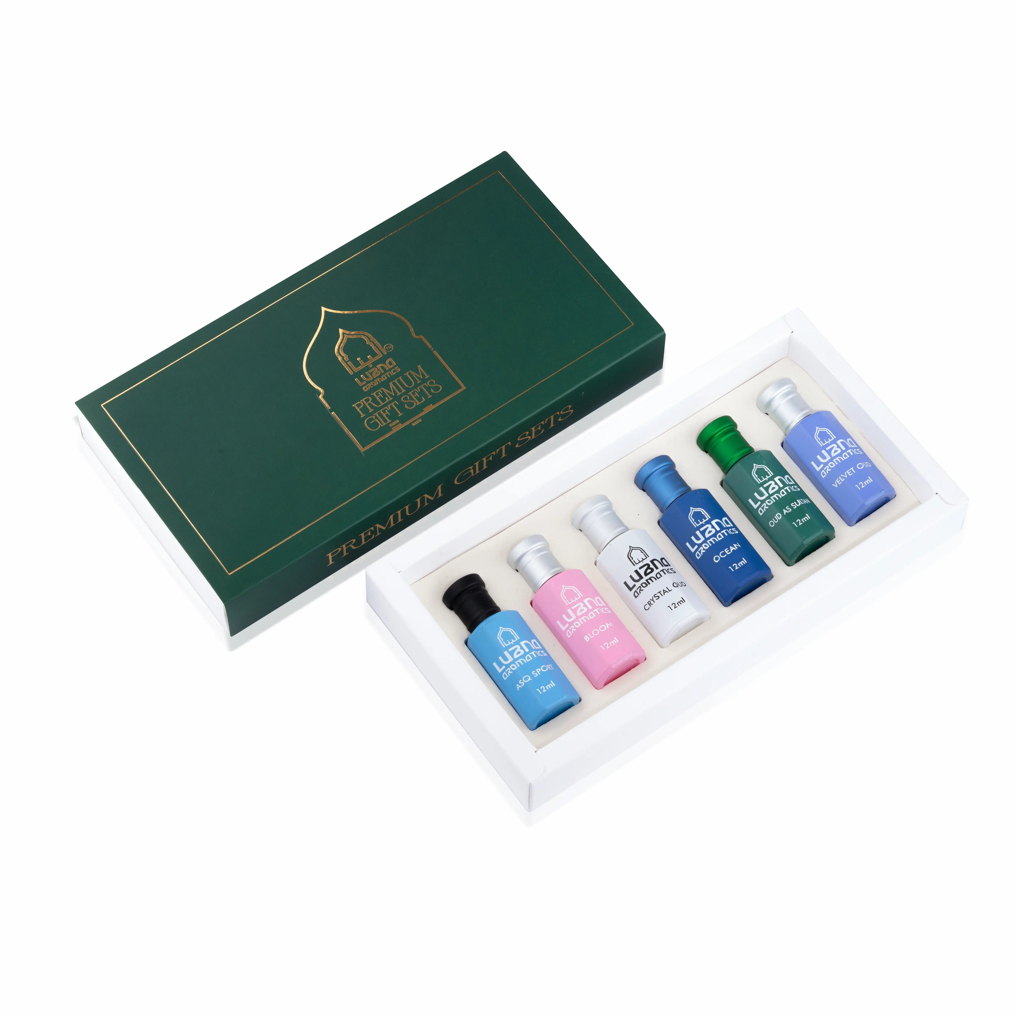 Collection of six signature attar perfumes showcasing a variety of citrus, floral, woody, and musk notes
