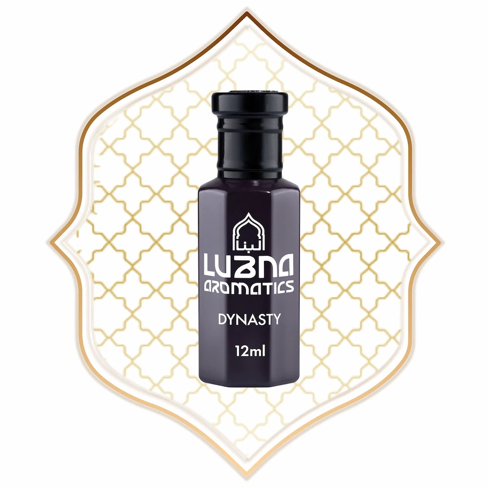Luzna Aromatics Dynasty 12ml bottle on a decorative white and gold background